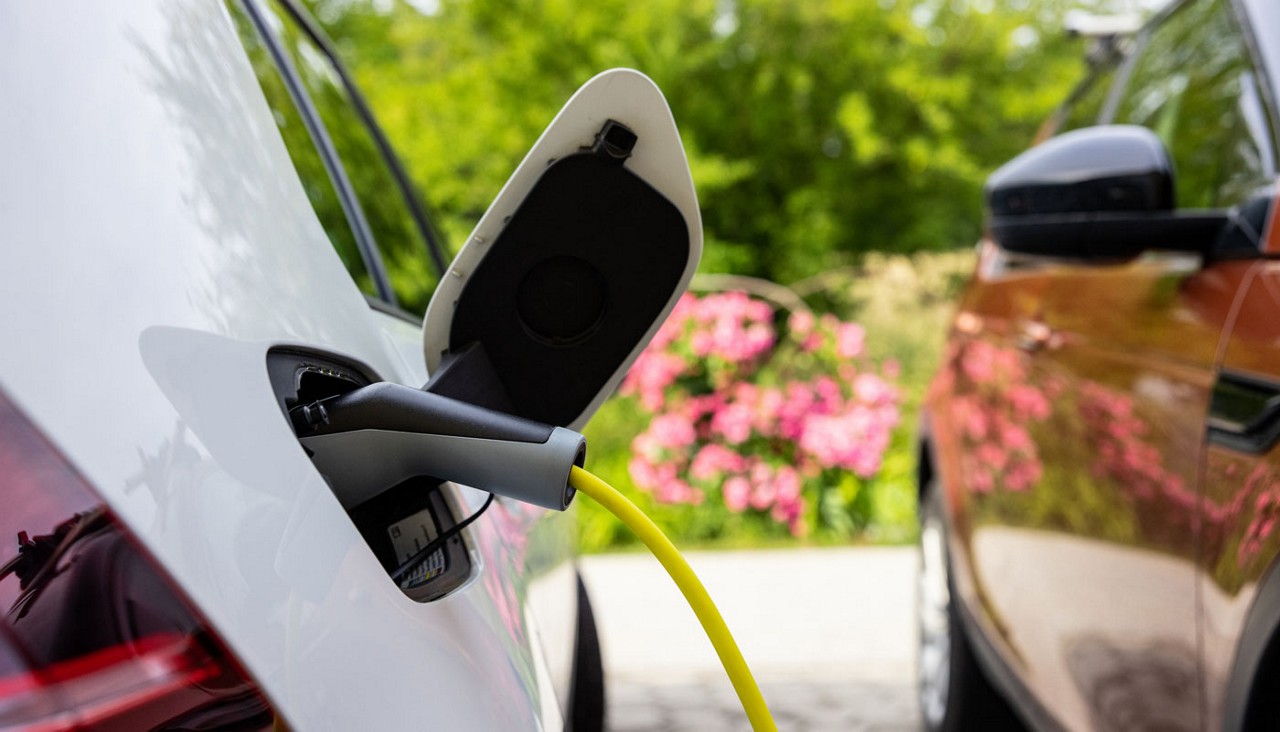 A close-up view of an electric vehicle being charged.