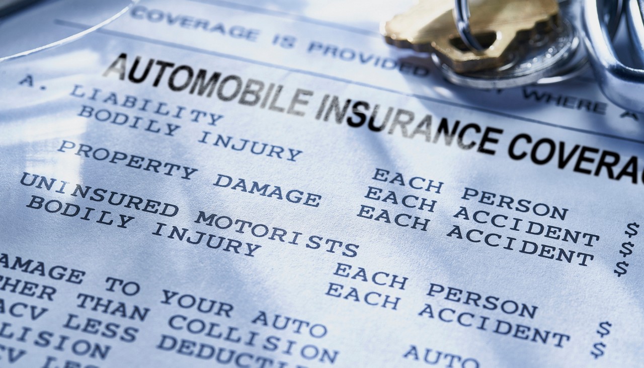 An up-close view of an auto insurance policy showing the declaration page.