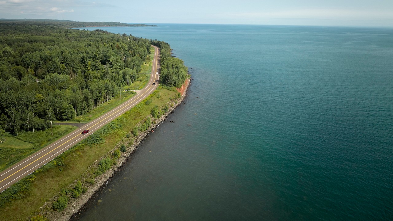 Tree lined road along the north shore of Lake Superior.